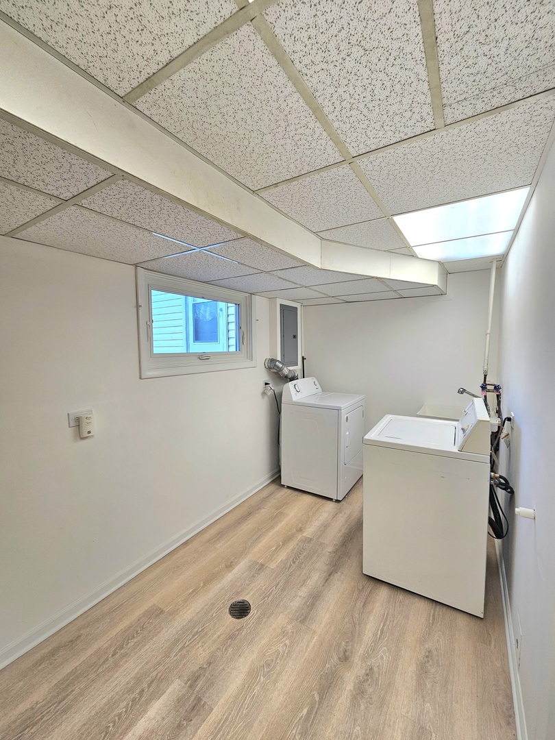 7434 Emerson Street Morton Grove, IL 60053 - Photo 31 of 43 a utility room with a washer and dryer