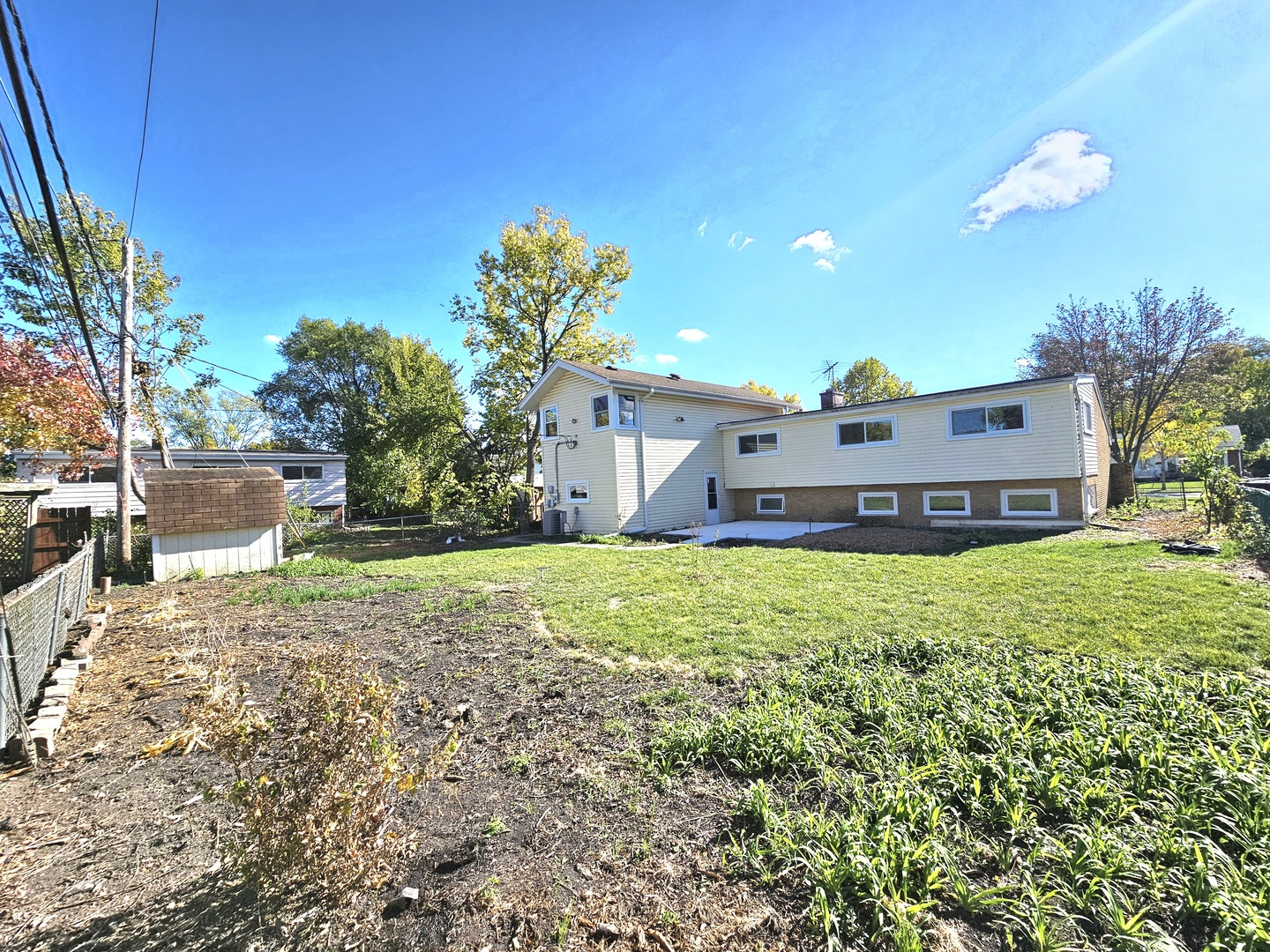 7434 Emerson Street Morton Grove, IL 60053 - Photo 37 of 43 a house view with a garden space