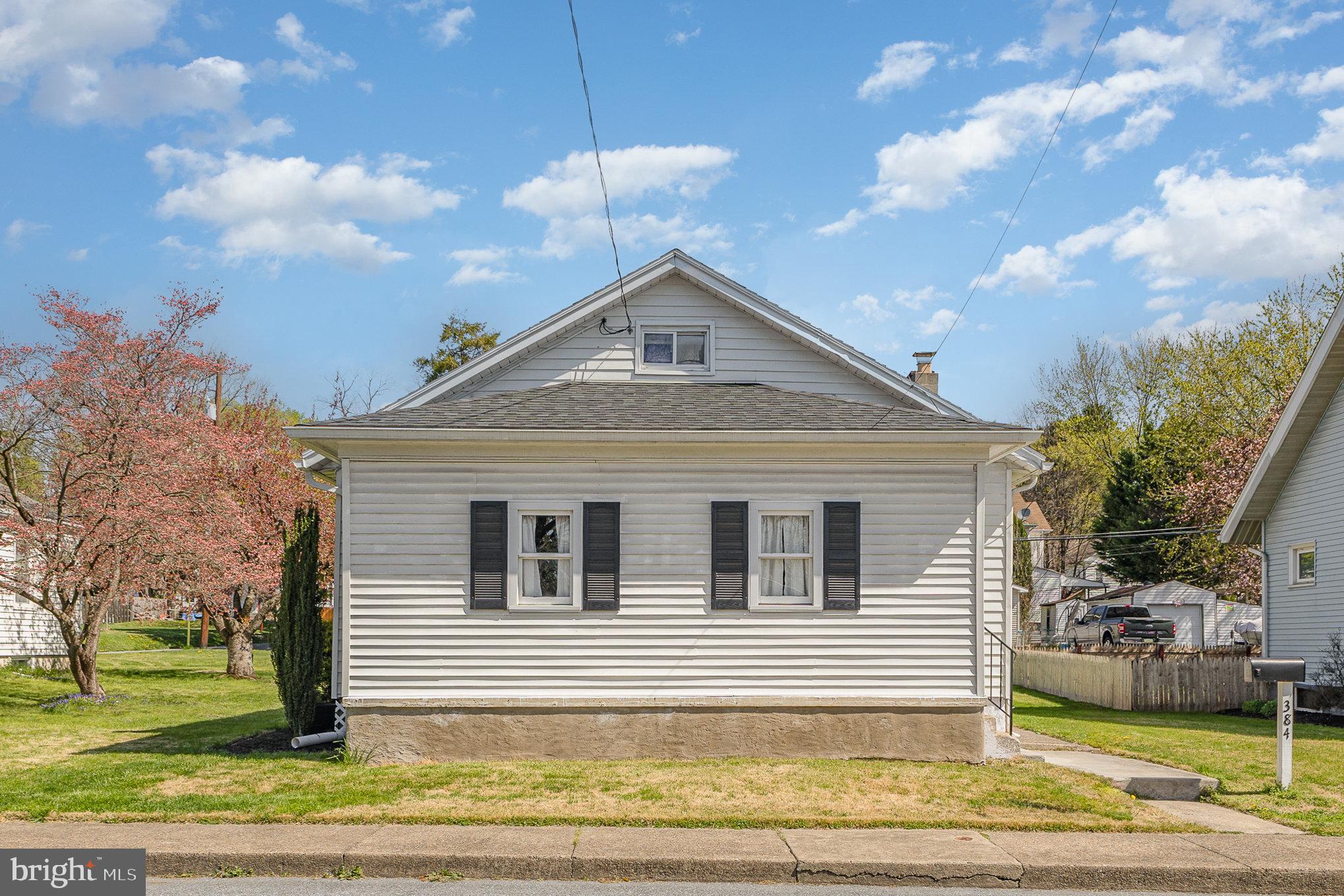 384 High Street Highspire, PA 17034 - Photo 2 of 35 a front view of a house with a yard