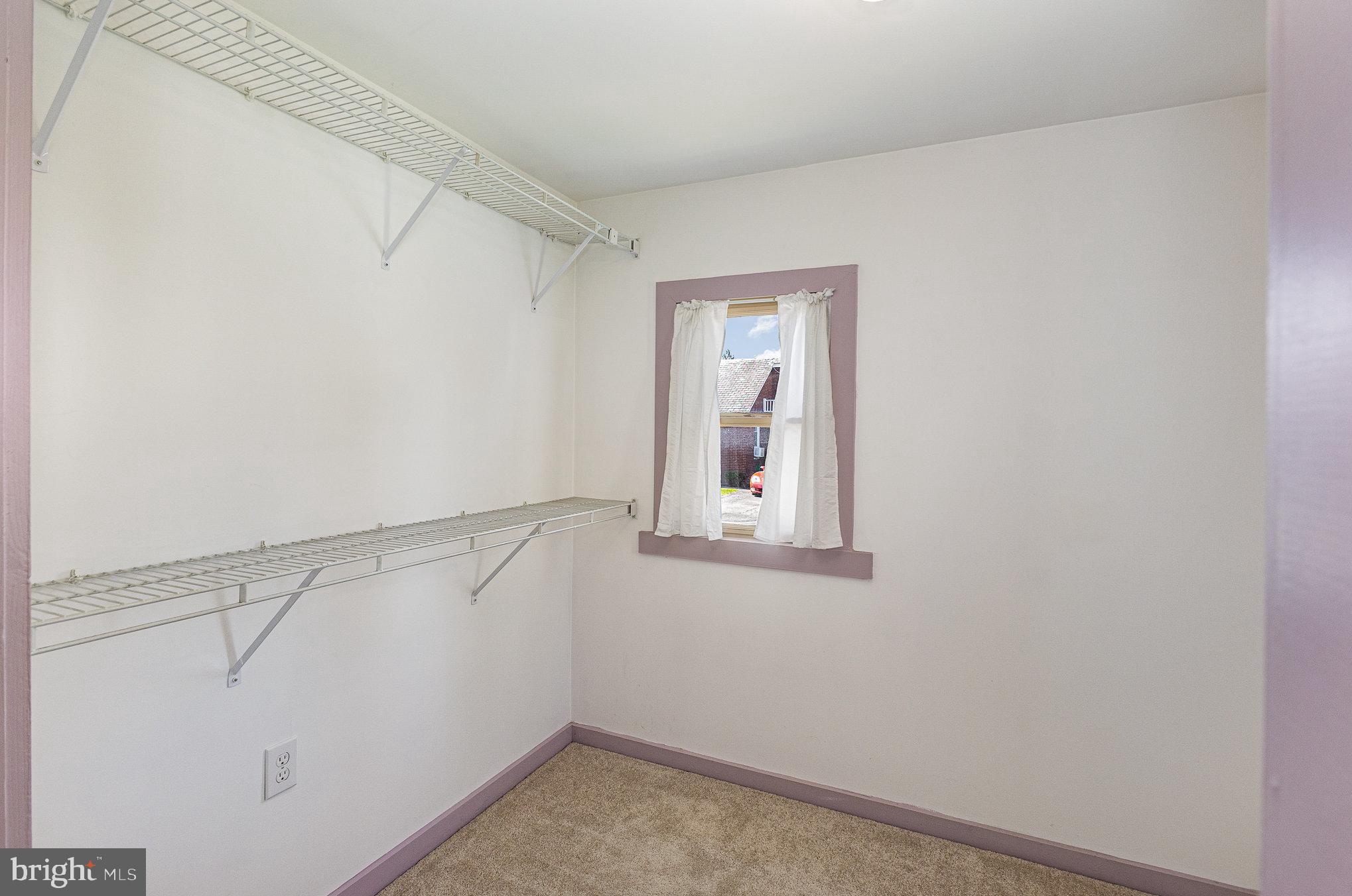 384 High Street Highspire, PA 17034 - Photo 22 of 35 a view of a room with racks on the wall