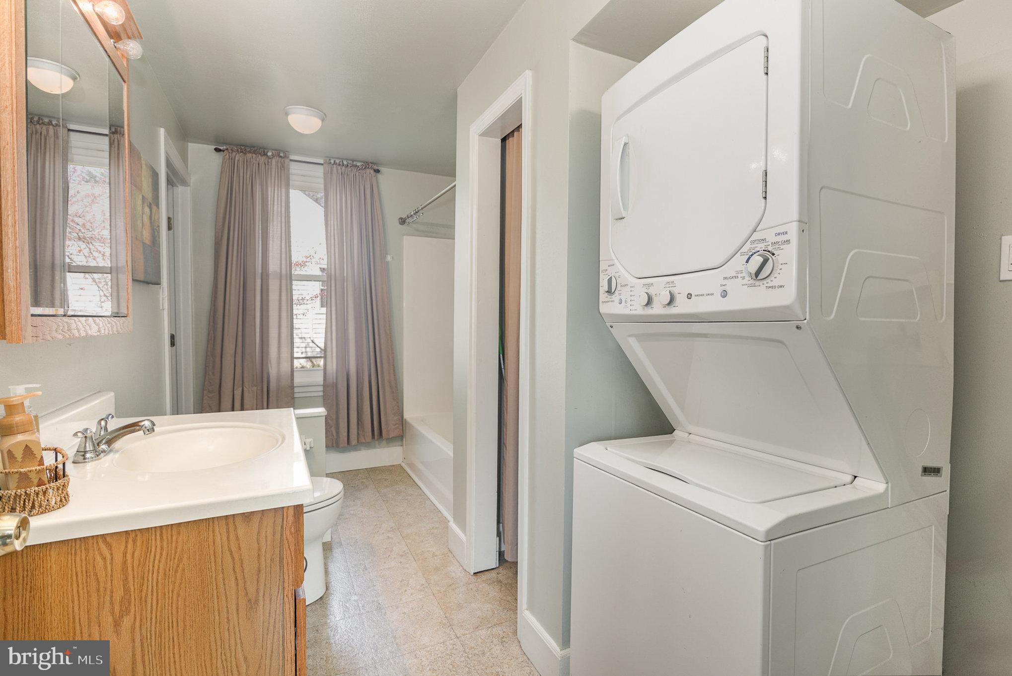 384 High Street Highspire, PA 17034 - Photo 26 of 35 a view of bathroom with a washer and dryer