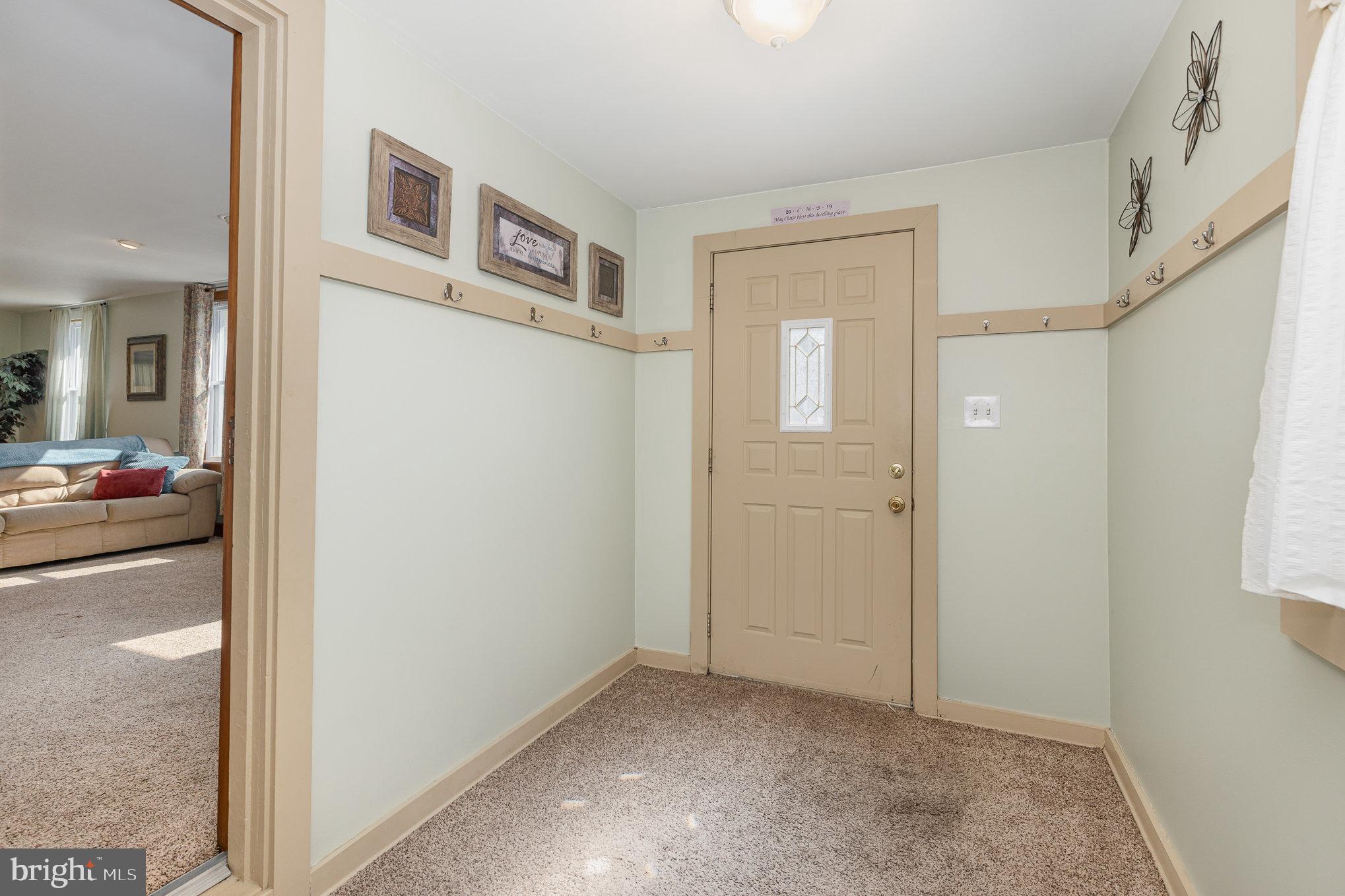 384 High Street Highspire, PA 17034 - Photo 4 of 35 a view of livingroom with hardwood floor and hallway