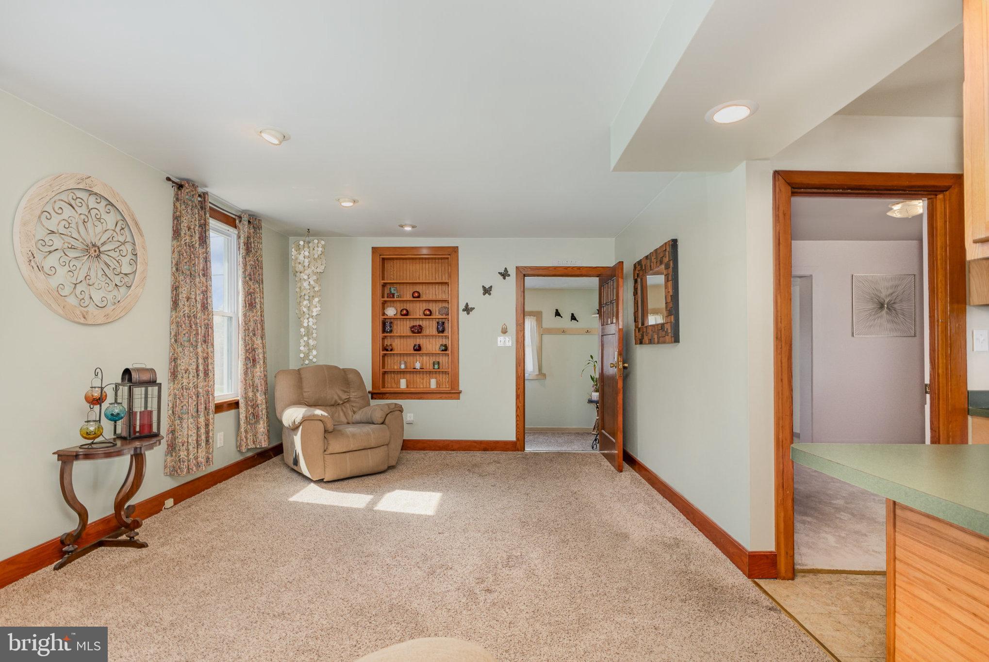384 High Street Highspire, PA 17034 - Photo 8 of 35 a view of room with furniture and a large window