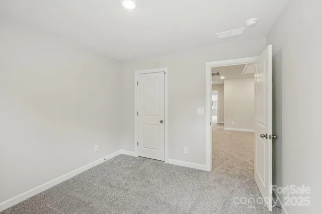 a bathroom with a shower sink and mirror