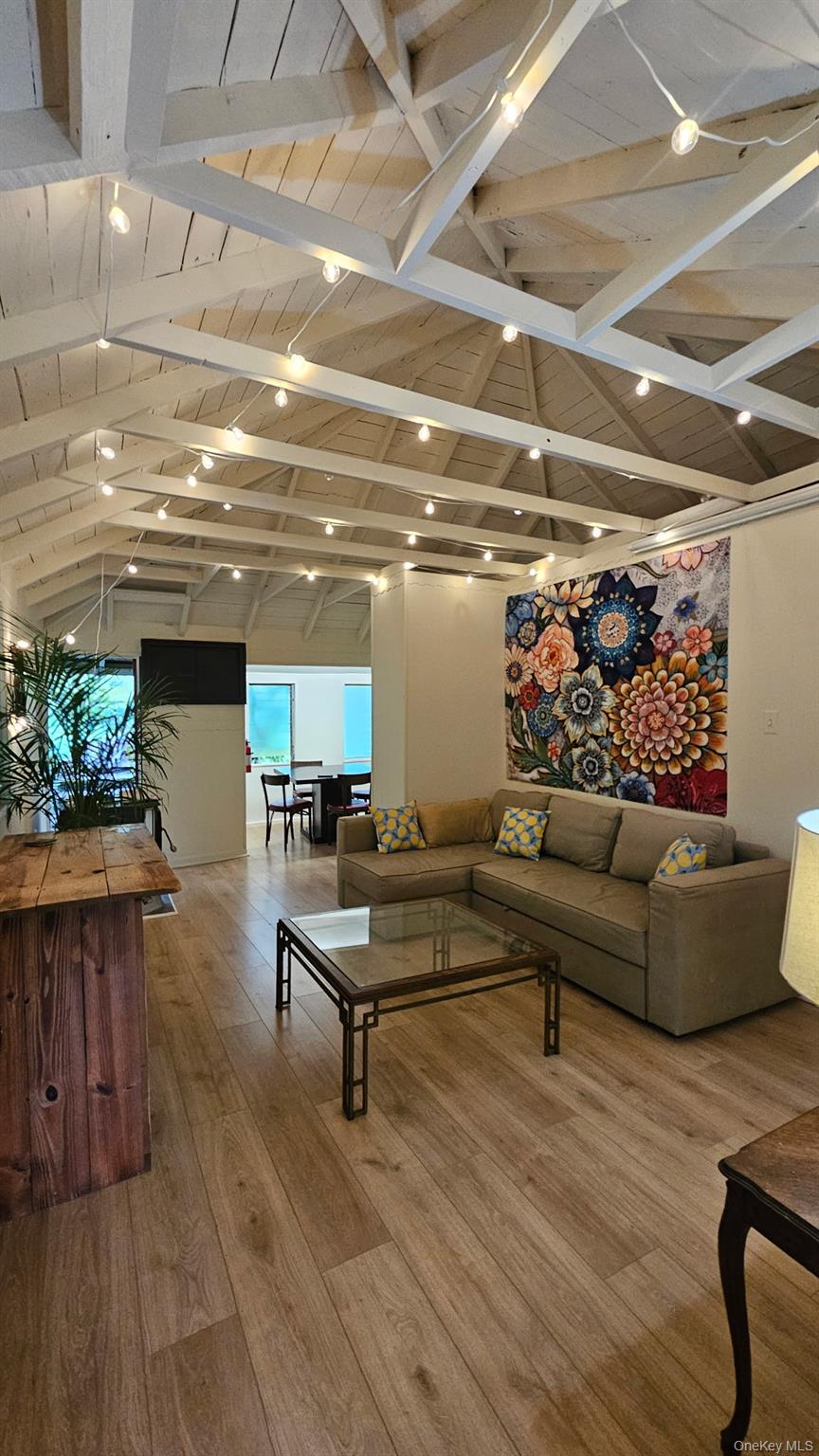 71 Miller Road, Unit 25 Hopewell Junction, NY 12533 - Photo 3 of 10 a living room with furniture and a wooden floor