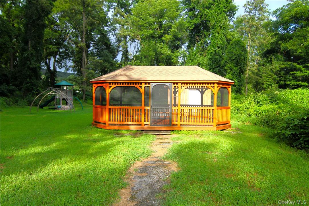 71 Miller Road, Unit 25 Hopewell Junction, NY 12533 - Photo 7 of 10 a view of a house with a backyard