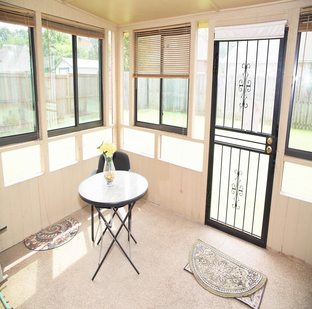 8483 Boothes Ridge Drive Memphis, TN 38125 - Photo 17 of 38 Sunroom with wooden walls