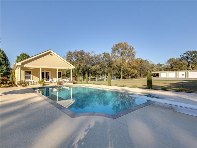 639 Fellowship Road Mount Juliet, TN 37122 - Photo 1 of 17 Pool to Workshop view; note there are 4 -14x14' doors on the 60 x 80' area and then another open shed that is 20x60'