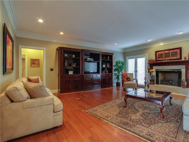 639 Fellowship Road Mount Juliet, TN 37122 - Photo 6 of 17 Spacious Great Room with gas fireplace, custom hearth, beautiful hardwood floors and a custom built, solid wood entertainment center