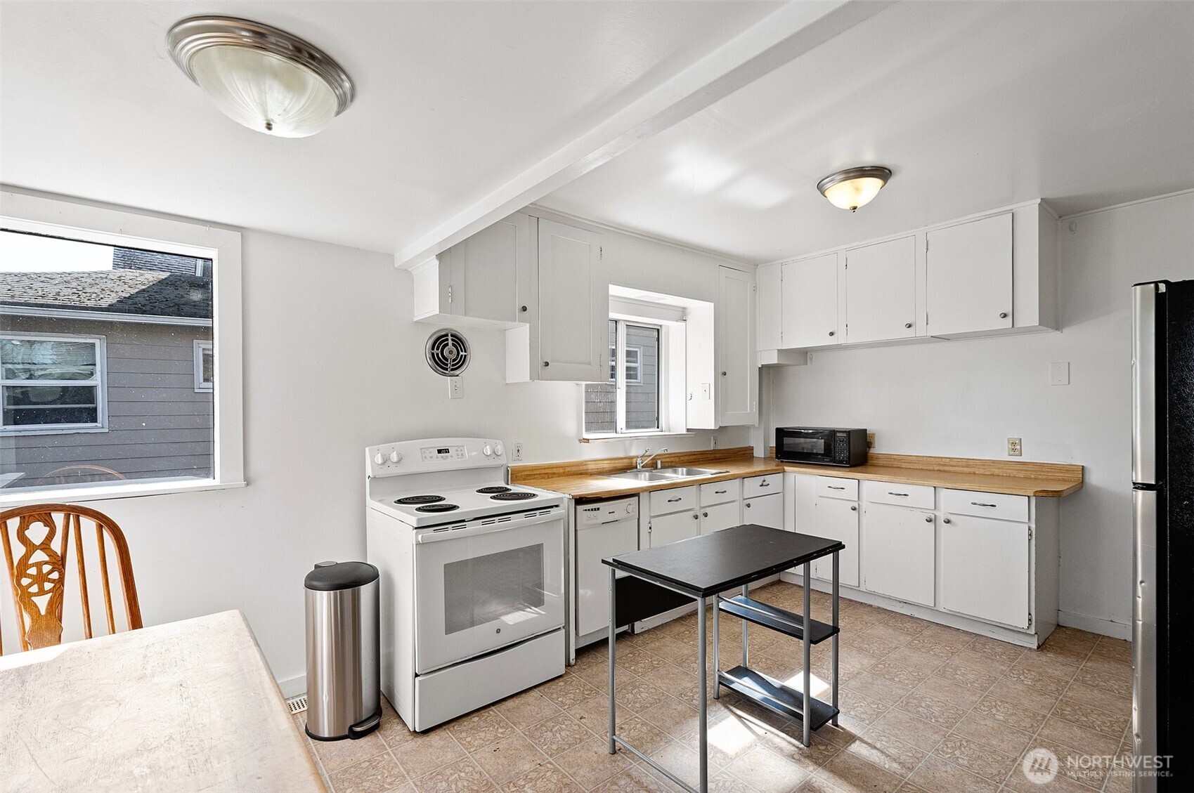 5016 7th Avenue Northeast Seattle, WA 98105 - Photo 17 of 36 a view of a kitchen counter space and a sink