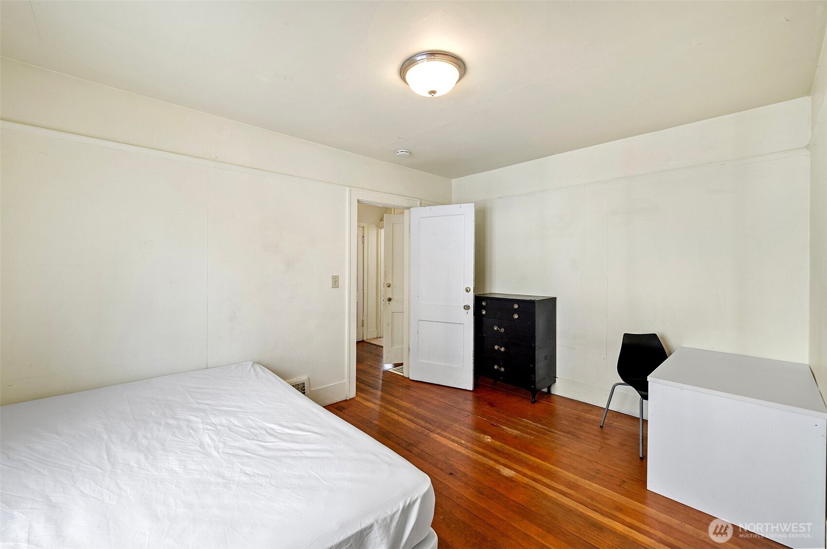 5016 7th Avenue Northeast Seattle, WA 98105 - Photo 20 of 36 a view of empty room with wooden floor