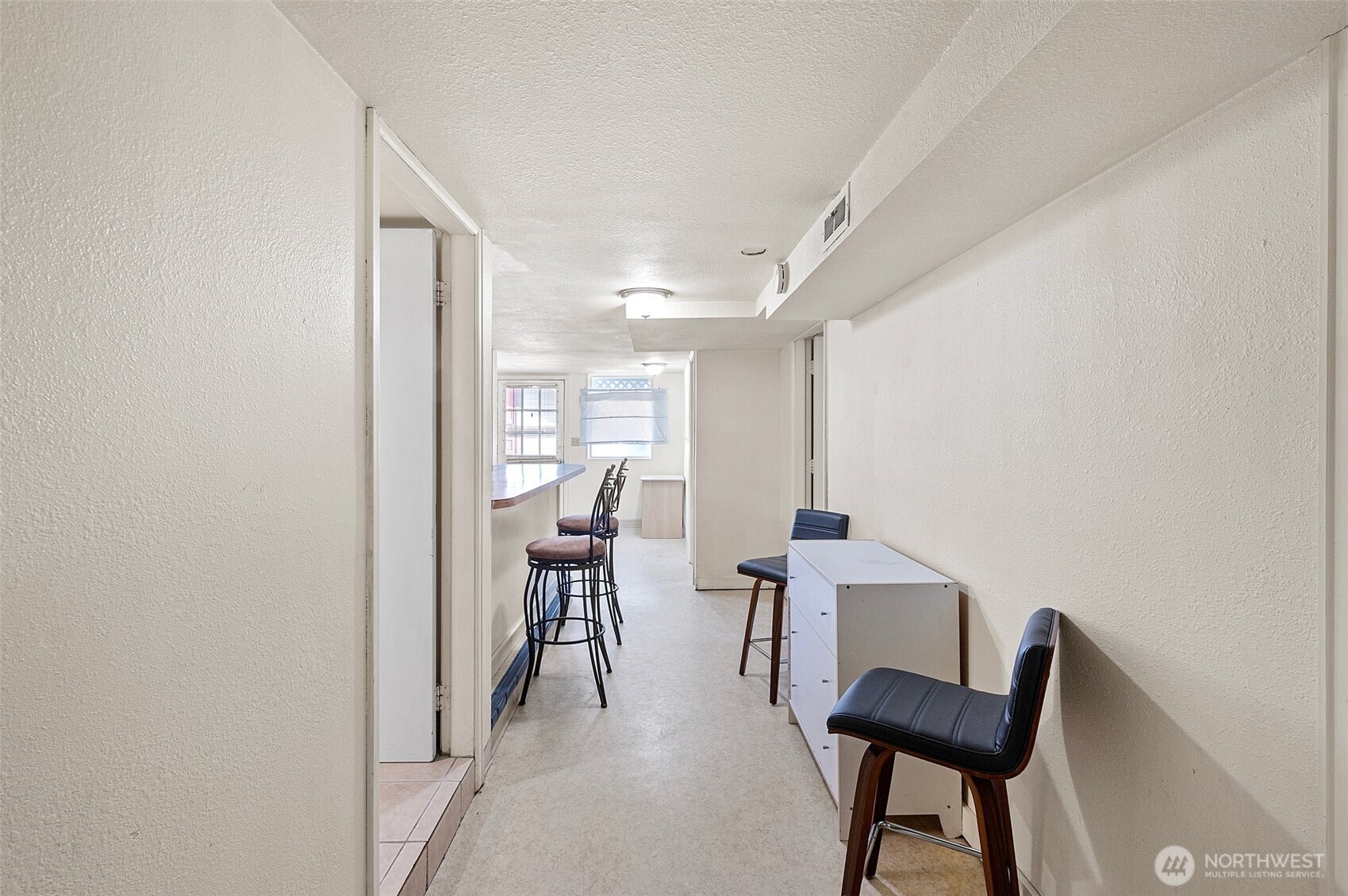5016 7th Avenue Northeast Seattle, WA 98105 - Photo 26 of 36 a view of hall way with furniture and rug