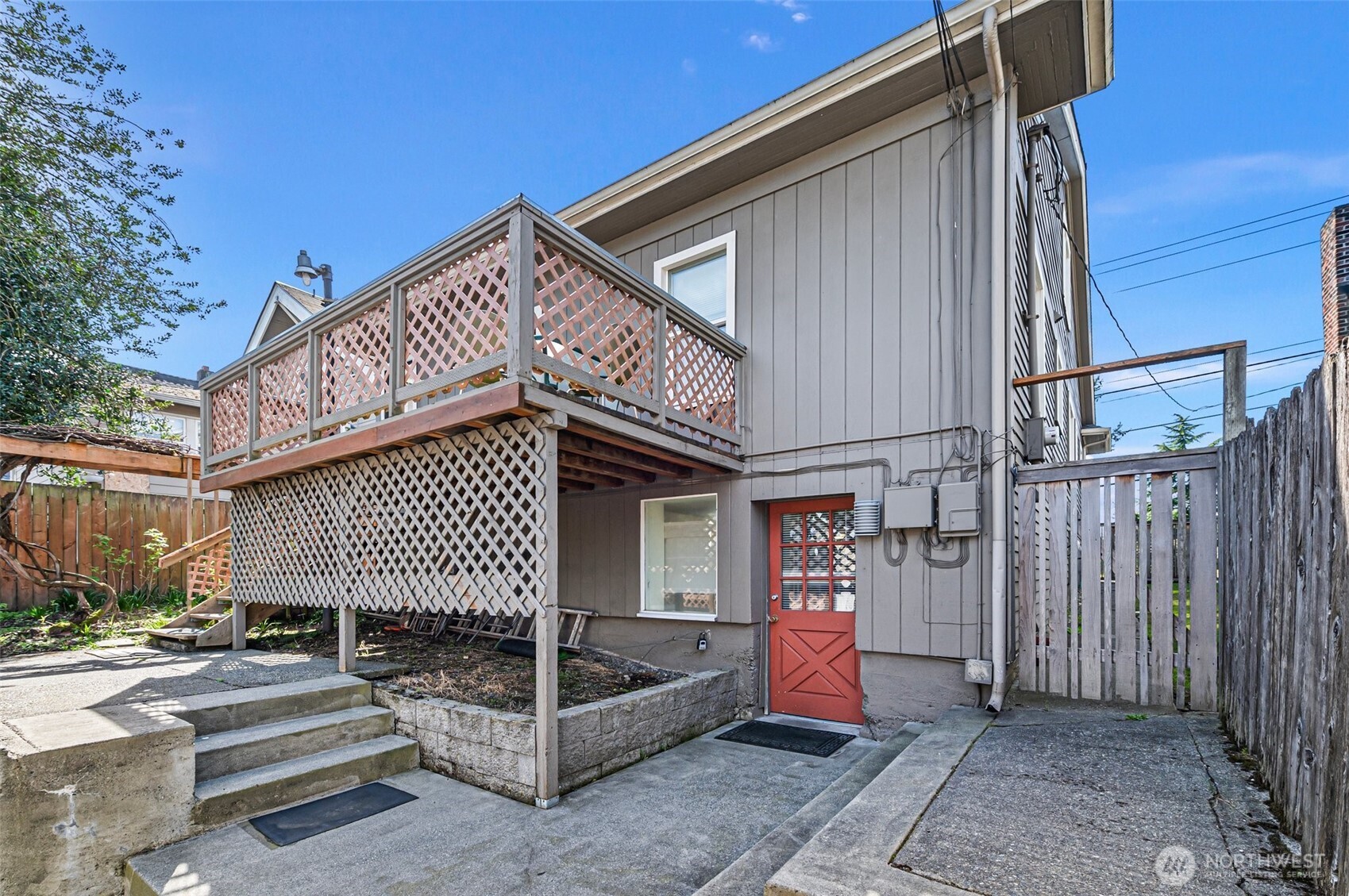 5016 7th Avenue Northeast Seattle, WA 98105 - Photo 33 of 36 a view of a house with backyard and sitting area