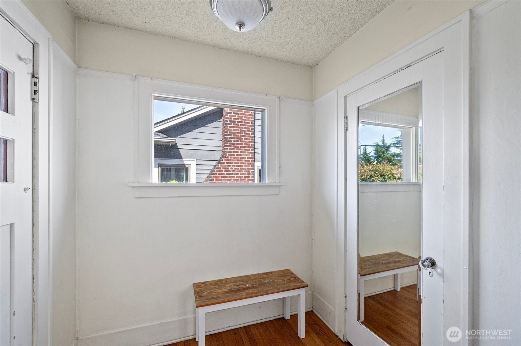 5016 7th Avenue Northeast Seattle, WA 98105 - Photo 6 of 36 a view of room with window and hallway