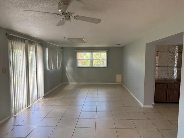 a view of an empty room and window