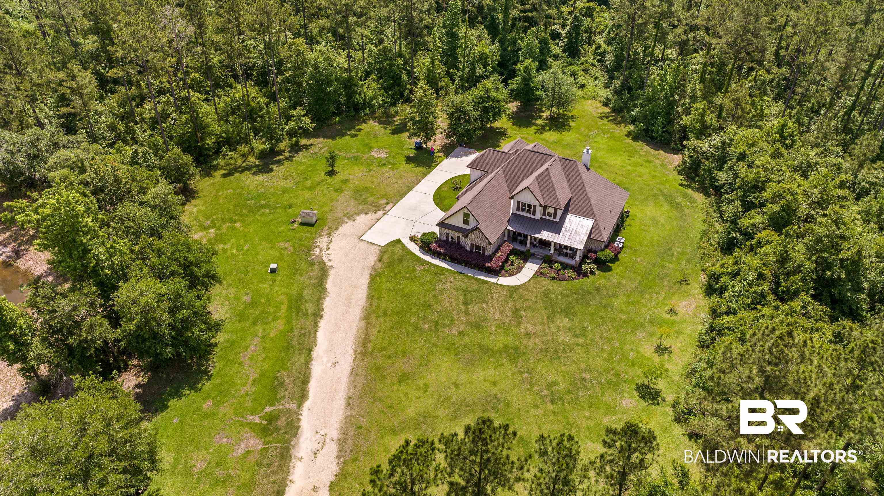 36784 Legacy Way Bay Minette, AL 36507 - Photo 49 of 57 View of subject property with a heavily wooded area