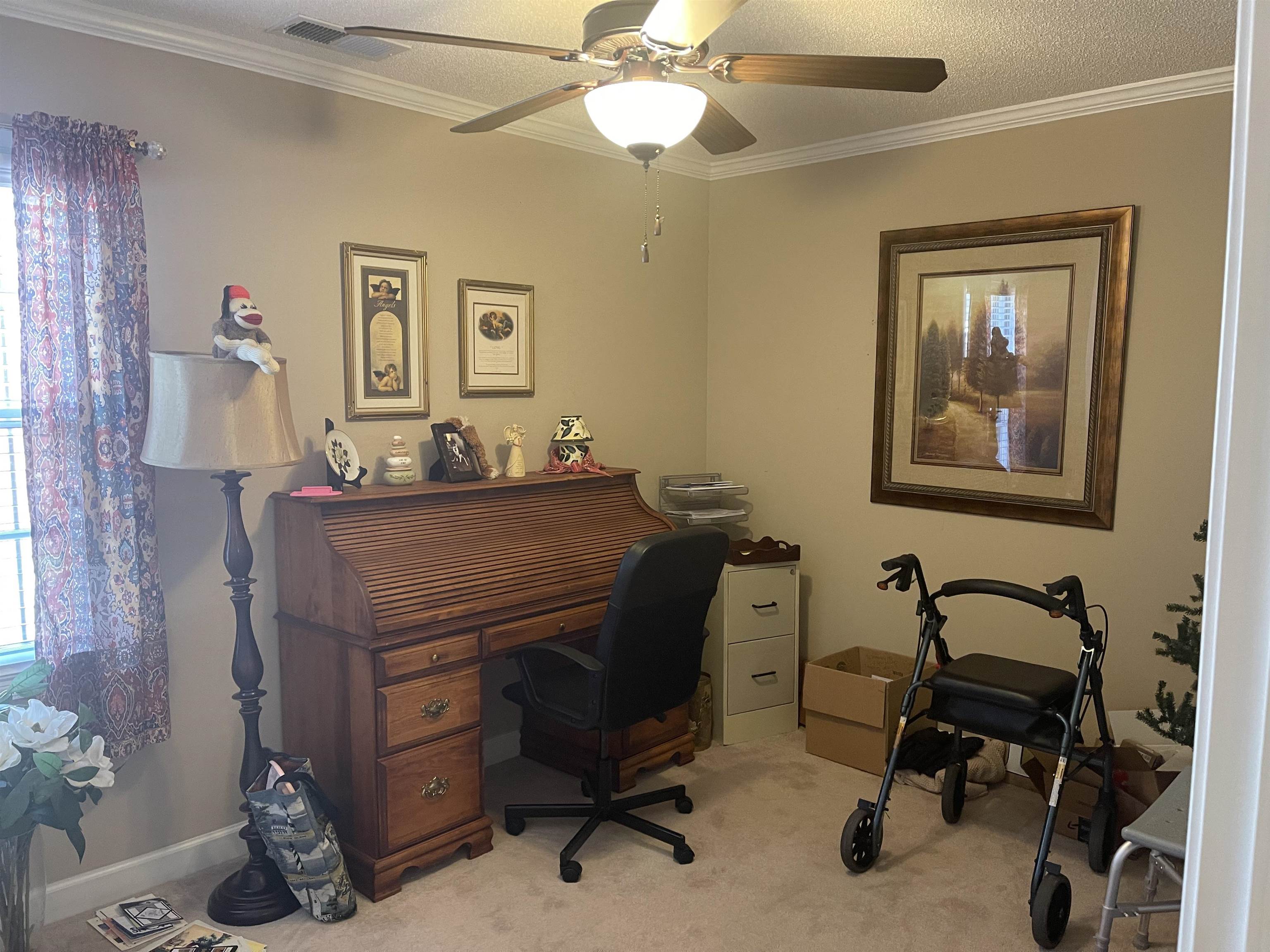 2346 Imogene Street Memphis, TN 38114 - Photo 11 of 16 a view of a workspace with furniture and a window