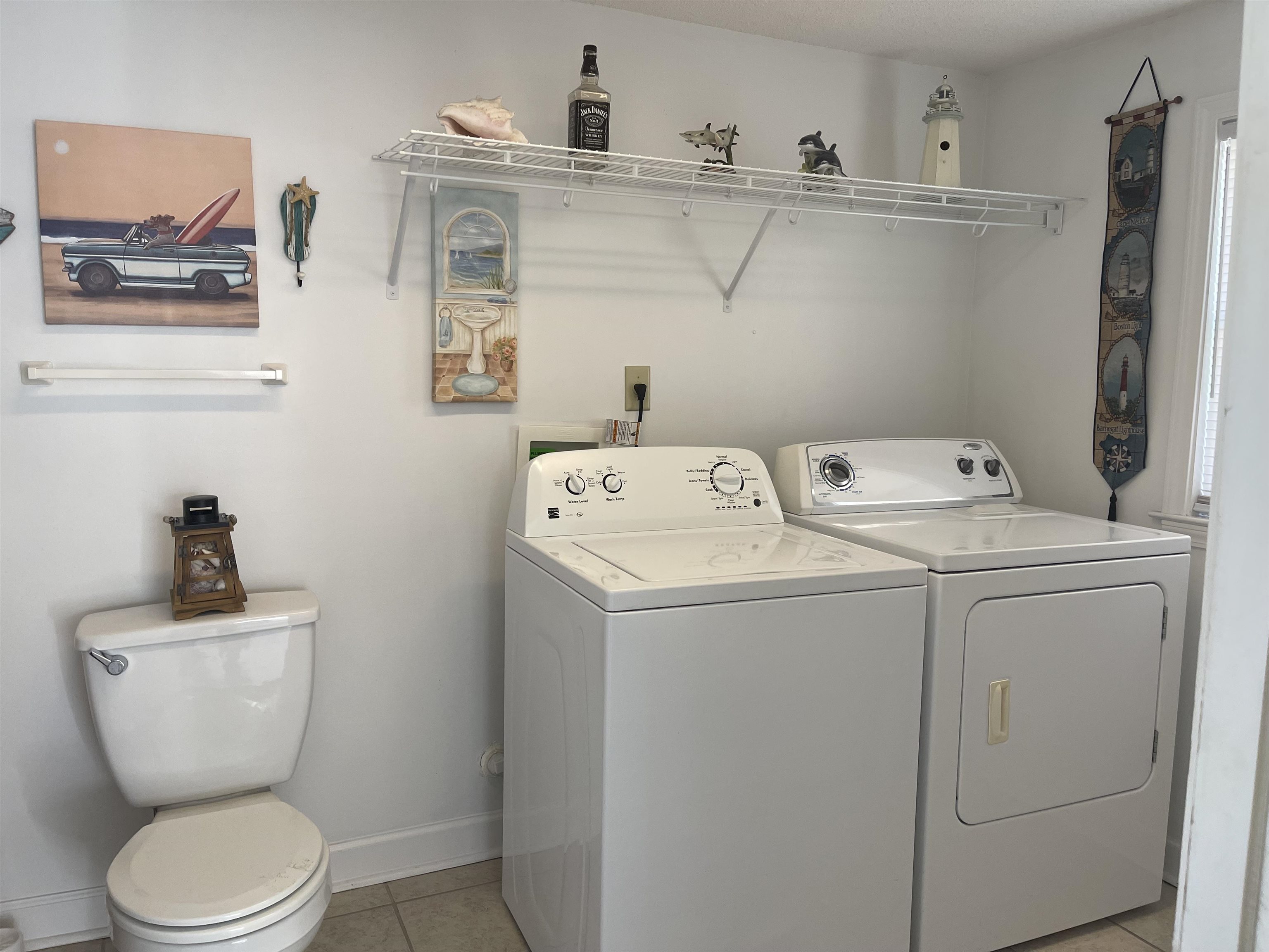 2346 Imogene Street Memphis, TN 38114 - Photo 13 of 16 a utility room with dryer and washer