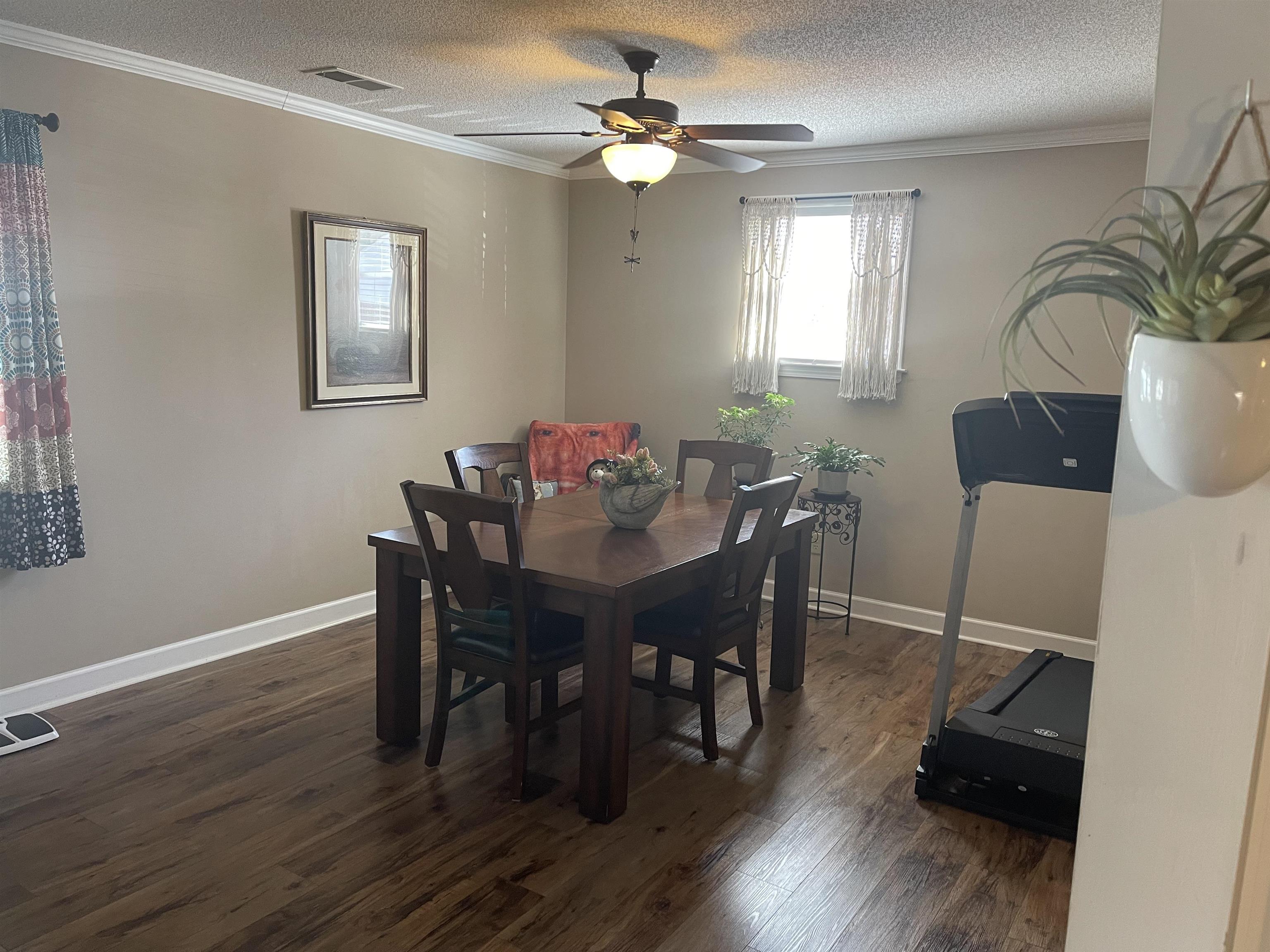 2346 Imogene Street Memphis, TN 38114 - Photo 4 of 16 a view of a dining room with furniture window and wooden floor
