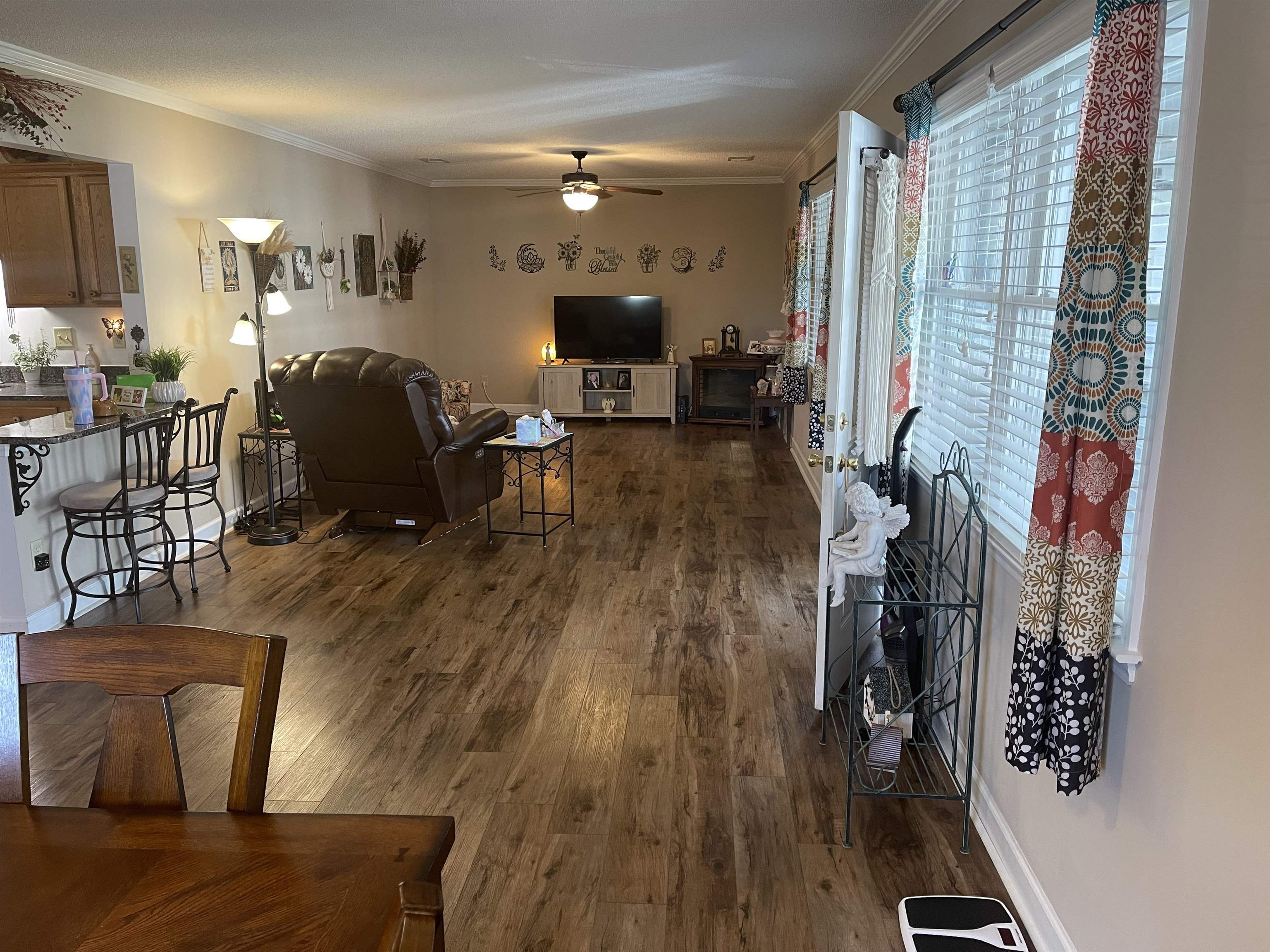 2346 Imogene Street Memphis, TN 38114 - Photo 6 of 16 a living room with furniture and a wooden floor