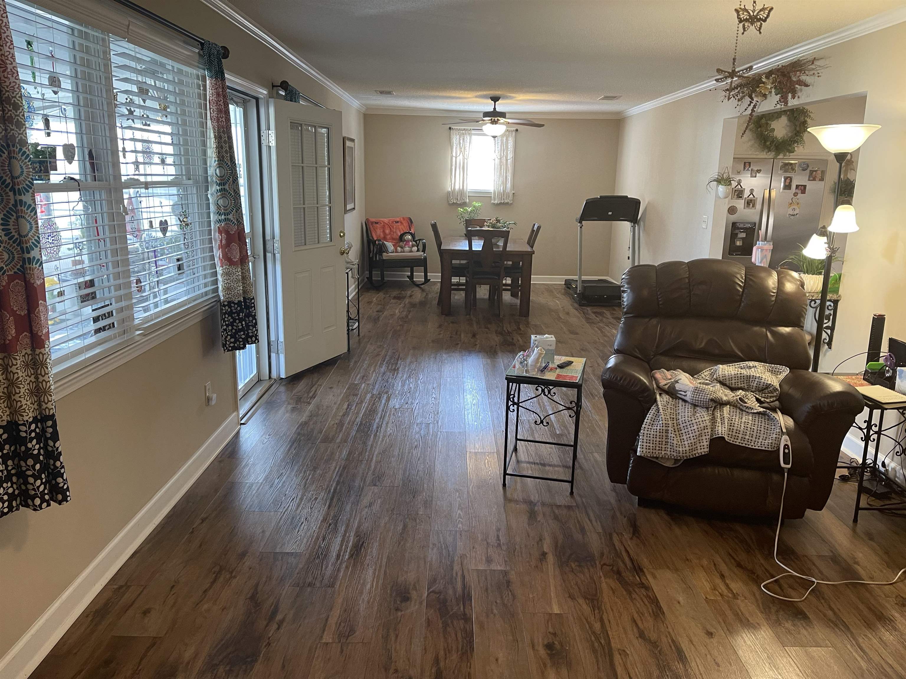 2346 Imogene Street Memphis, TN 38114 - Photo 7 of 16 a living room with furniture and a wooden floor