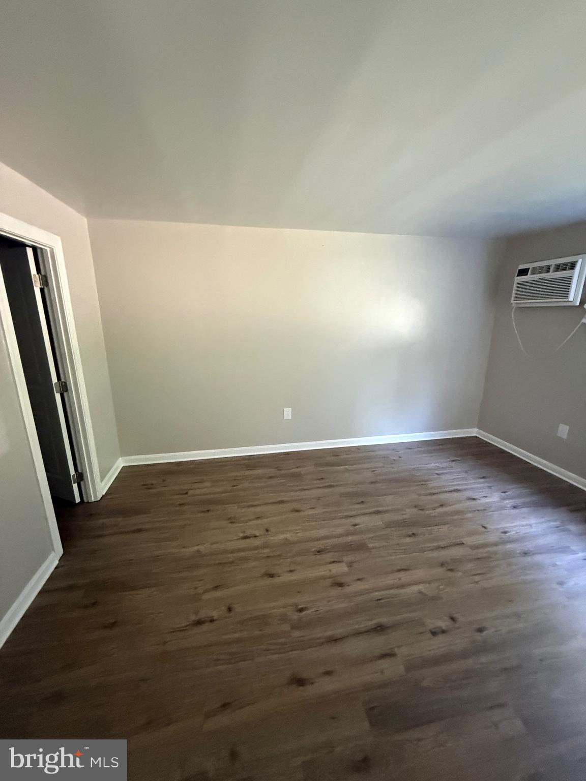 3105 Naylor Road Southeast, Unit 104 Washington, DC 20020 - Photo 6 of 12 wooden floor in an empty room