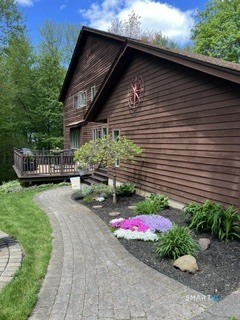 72 Pinnacle Road Ellington, CT 06029 - Photo 38 of 38 a backyard of a house with barbeque oven table and chairs