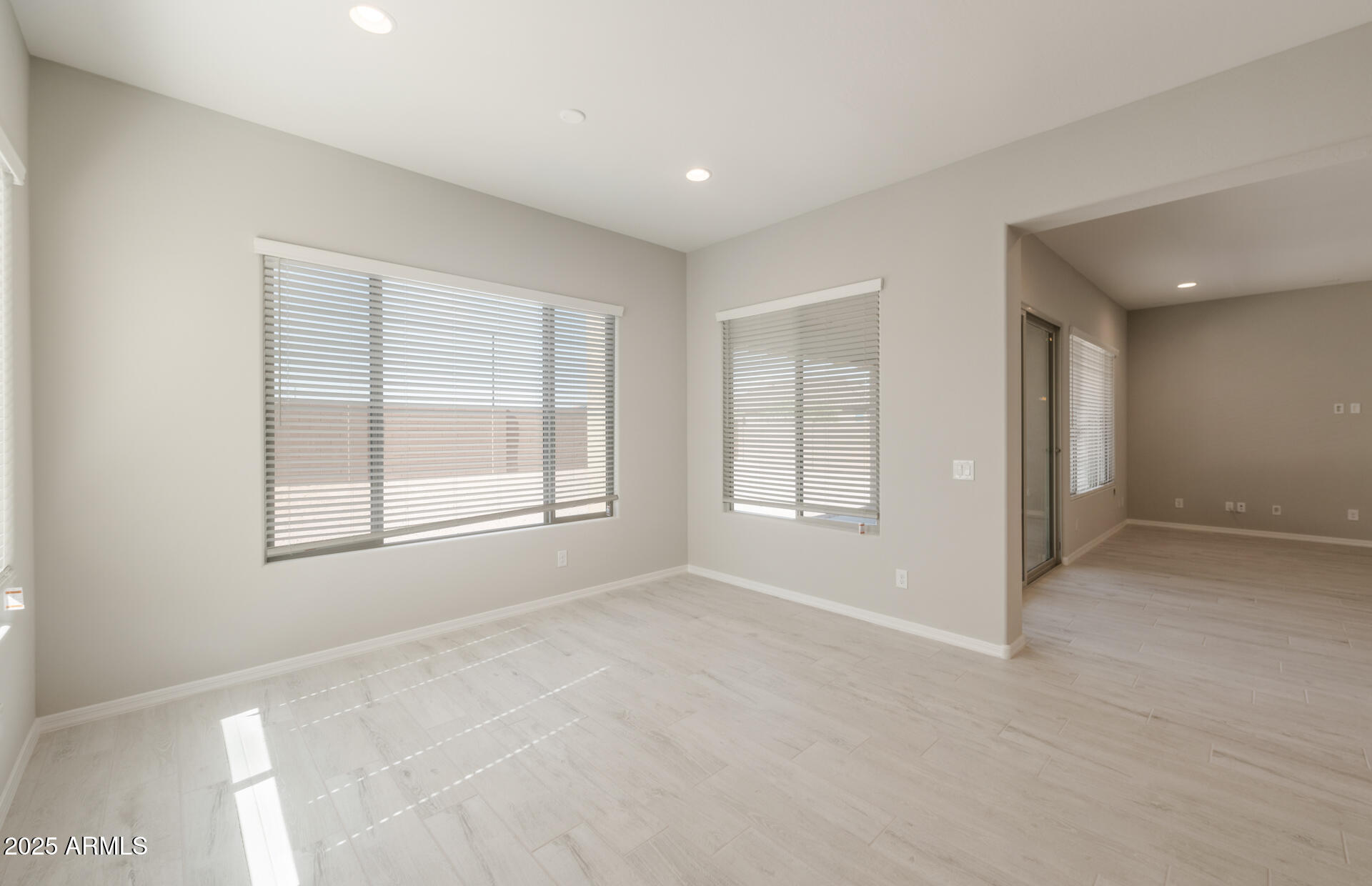 7802 West Mockingbird Way Florence, AZ 85132 - Photo 12 of 34 a view of an empty room with a window