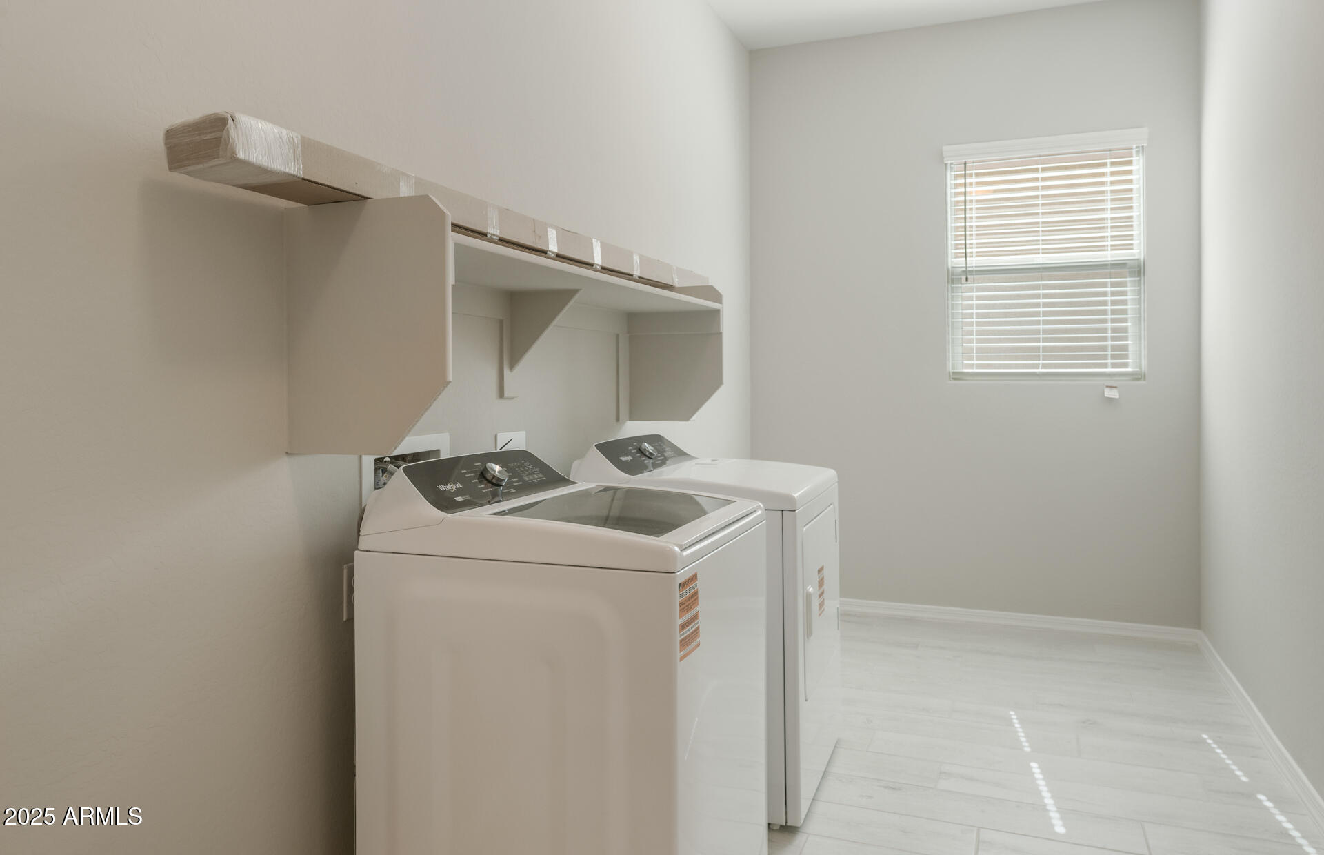 7802 West Mockingbird Way Florence, AZ 85132 - Photo 16 of 34 a utility room with dryer and washer