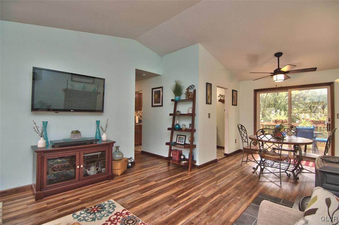 4280 Pne Rdg Drive Bushkill, PA 18324 - Photo 7 of 32 a living room with furniture and a flat screen tv