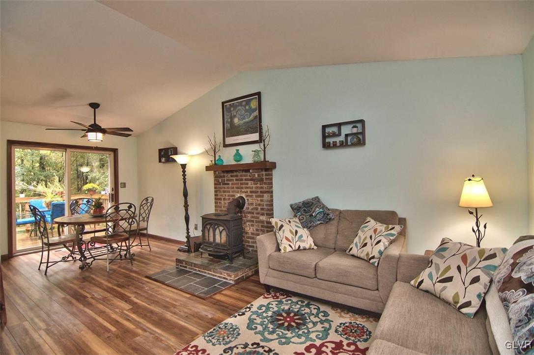 4280 Pne Rdg Drive Bushkill, PA 18324 - Photo 8 of 32 a living room with furniture and a wooden floor