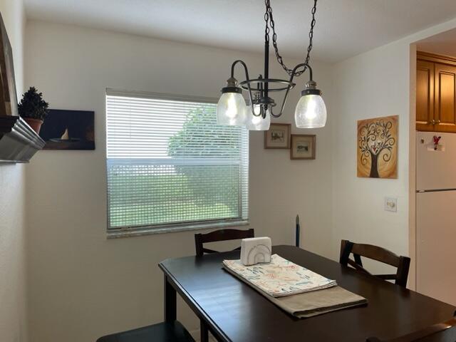 348 Monaco H Delray Beach, Unit 348 Delray Beach, FL 33446 - Photo 5 of 41 a view of a workspace with a window