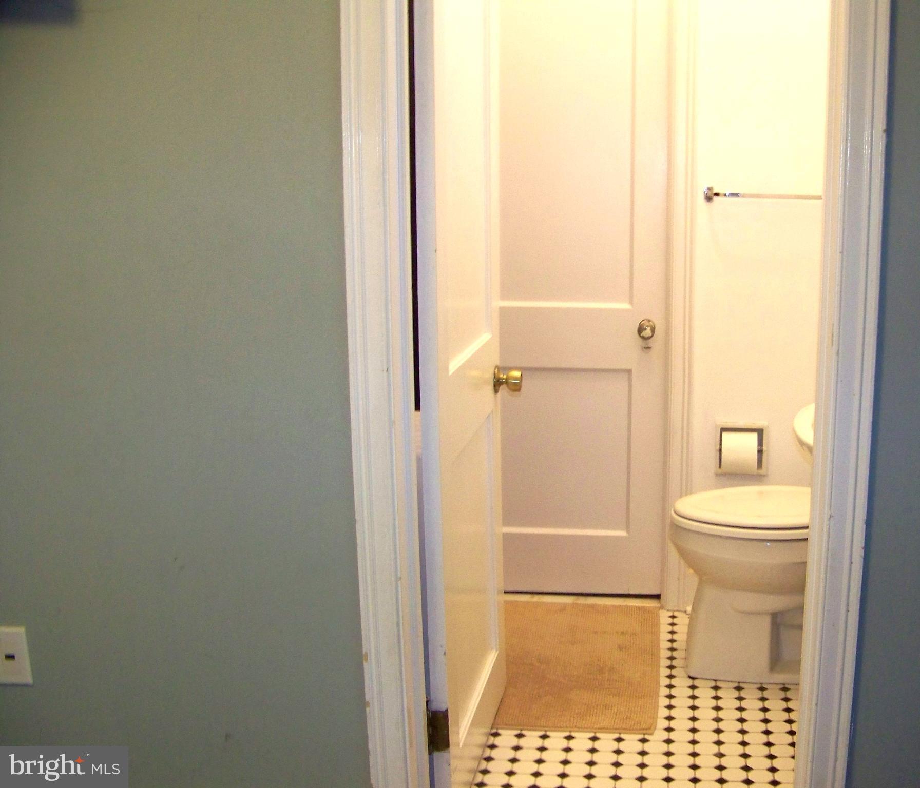 335 Bent Road Wyncote, PA 19095 - Photo 15 of 45 a bathroom with a toilet and a shower
