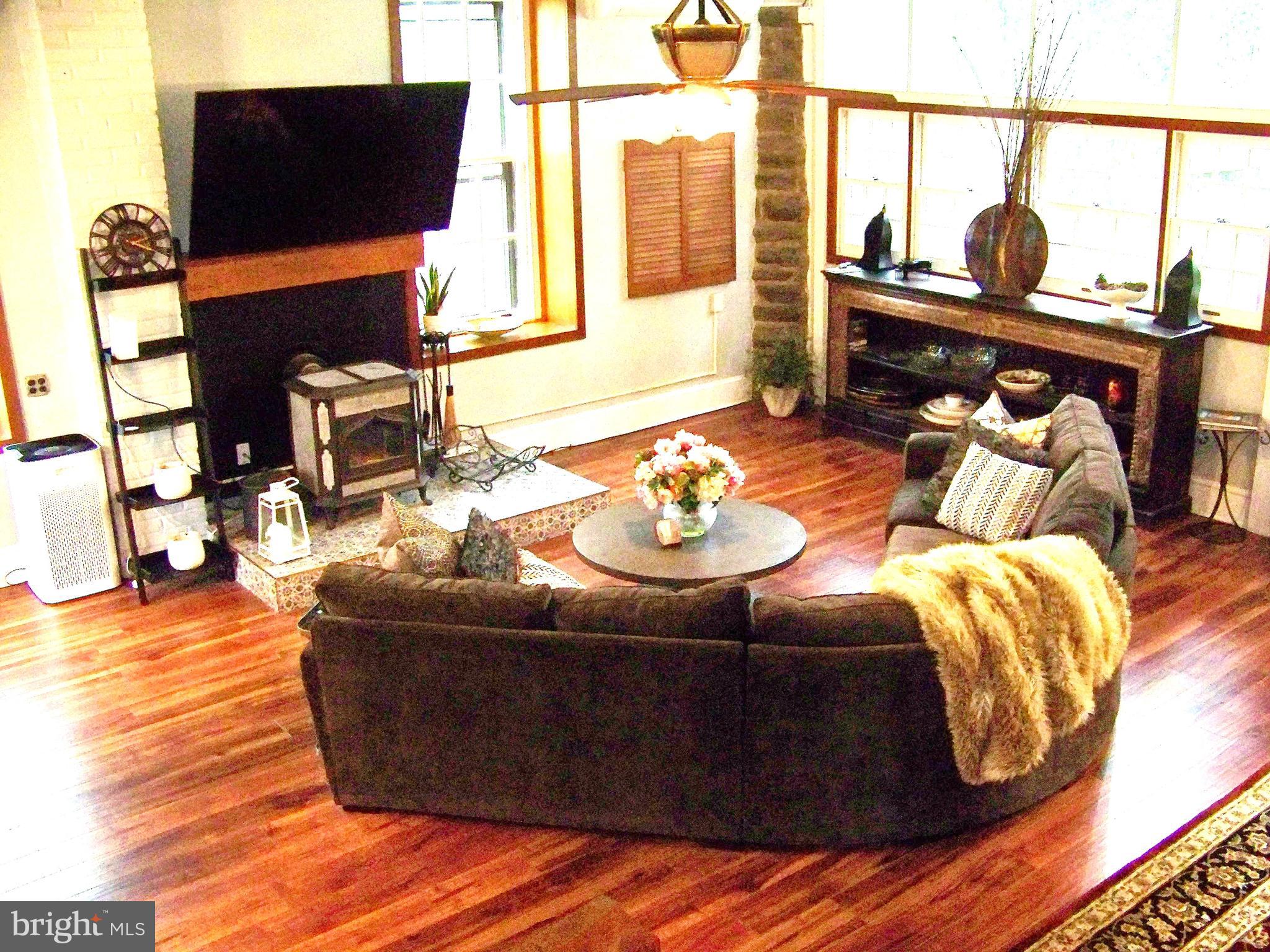 335 Bent Road Wyncote, PA 19095 - Photo 20 of 45 a living room with furniture and a flat screen tv