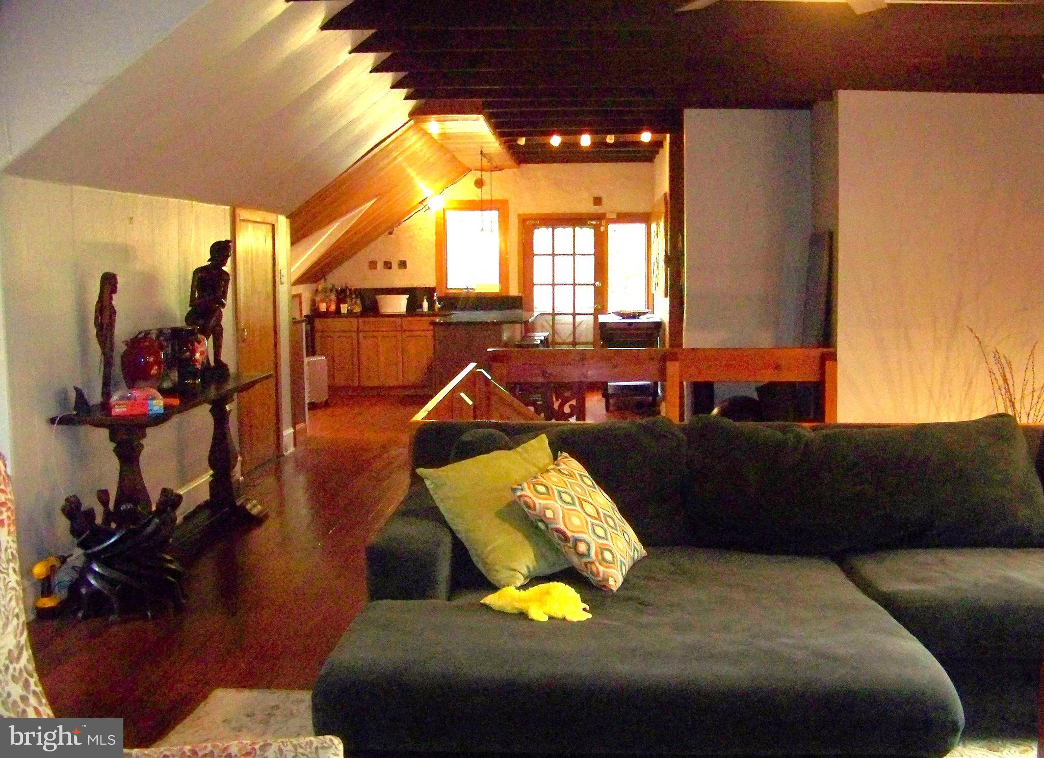 335 Bent Road Wyncote, PA 19095 - Photo 27 of 45 a living room with furniture and a flat screen tv