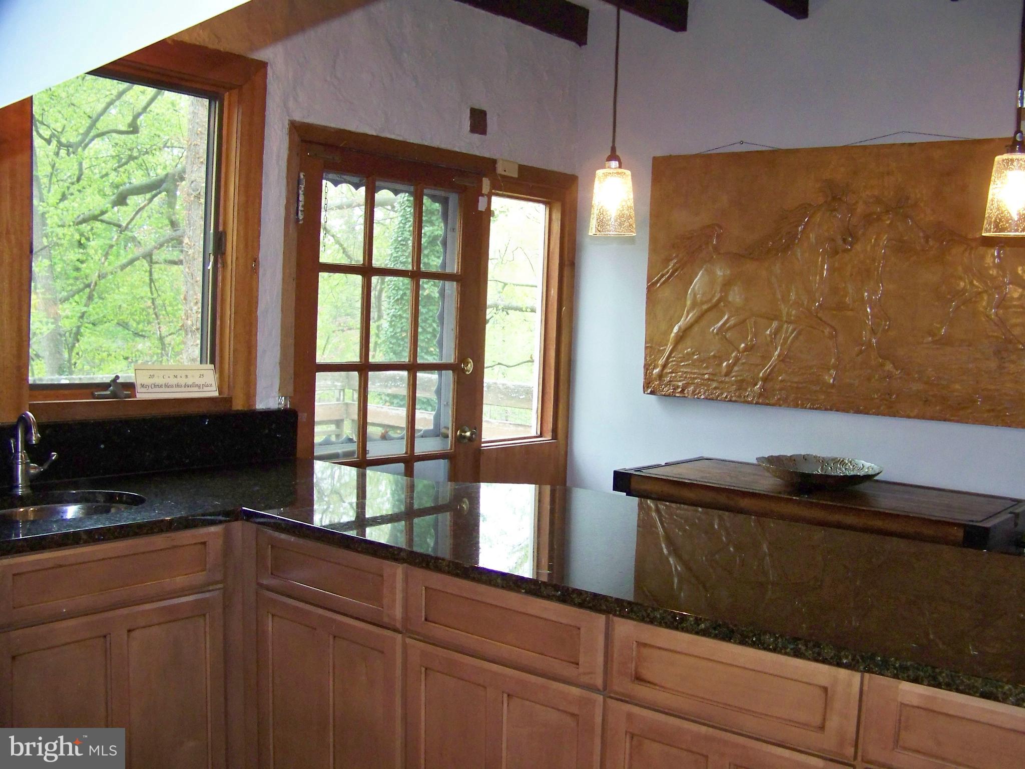335 Bent Road Wyncote, PA 19095 - Photo 29 of 45 a kitchen with a sink and a large window