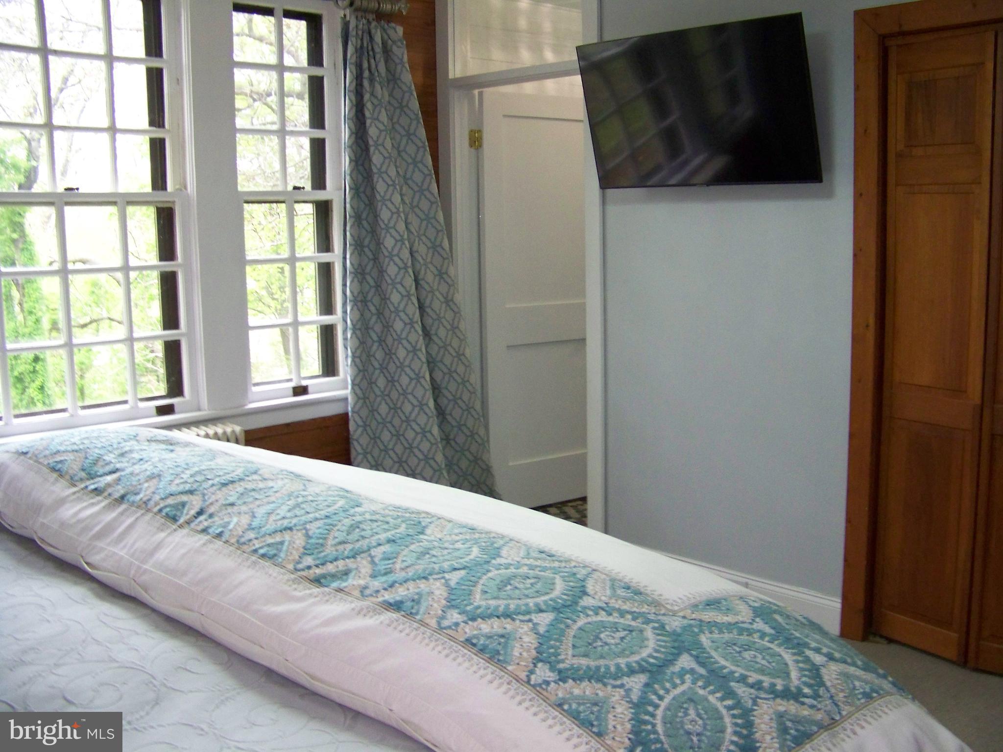 335 Bent Road Wyncote, PA 19095 - Photo 32 of 45 a bedroom with a bed and a window