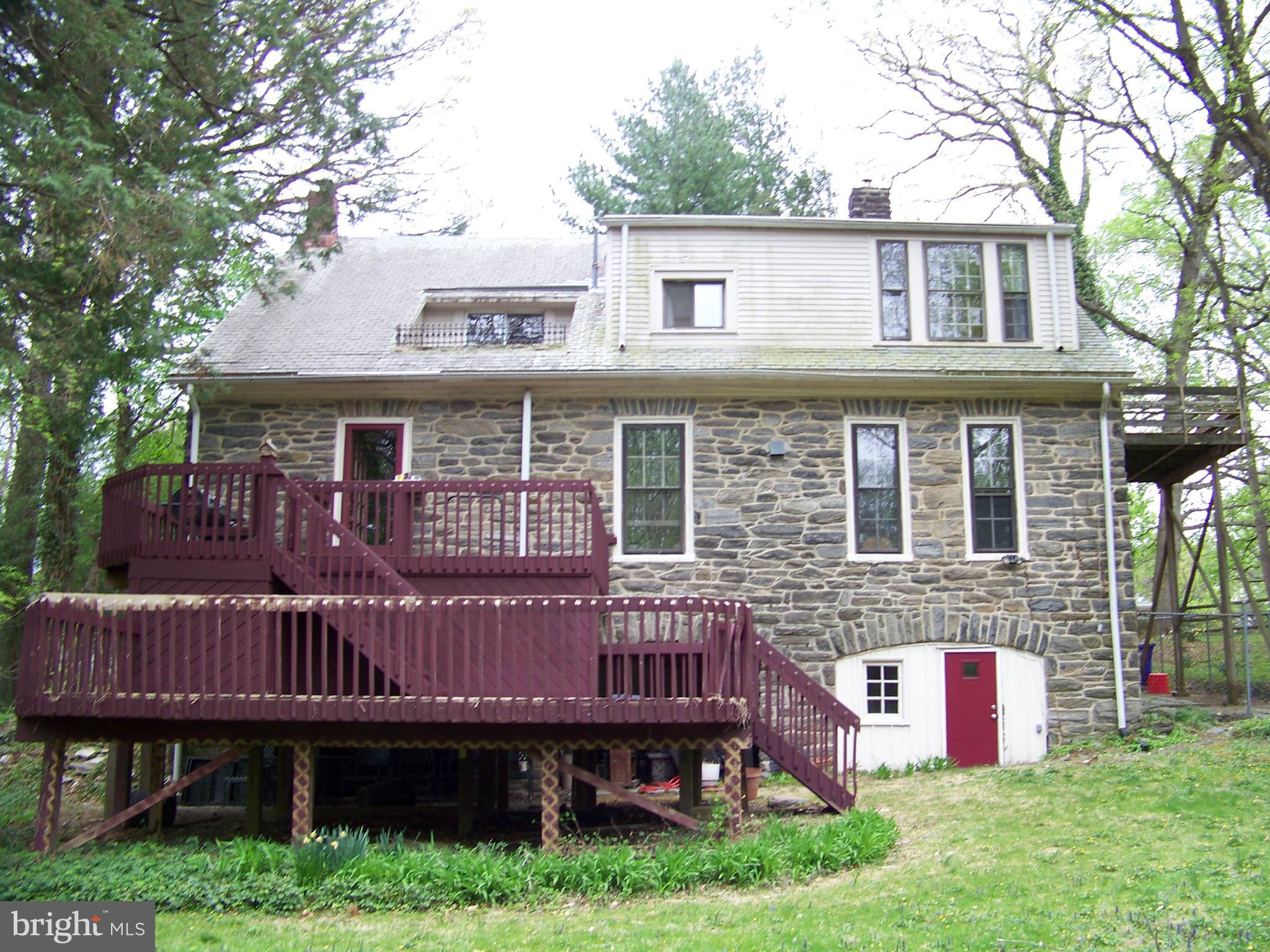 335 Bent Road Wyncote, PA 19095 - Photo 45 of 45 a view of a house with a deck and a yard