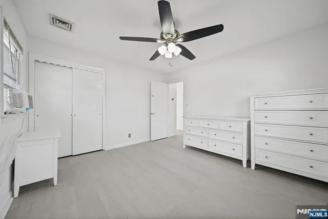 a view of a livingroom with cabinet
