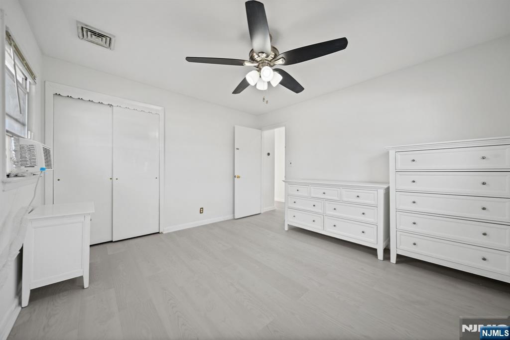 23 Arn Terrace, Unit 1 Secaucus, NJ 07094 - Photo 17 of 22 a view of a livingroom with cabinet