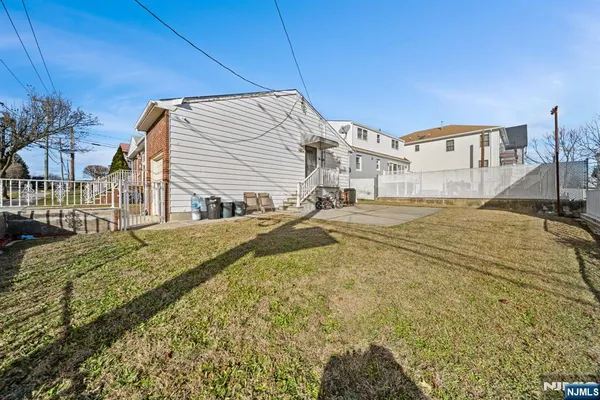 a bed sitting in middle of a house