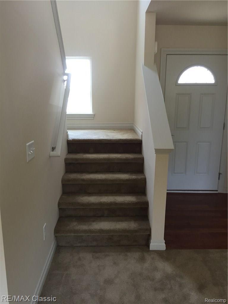 2137 Carson Lane Monroe, MI 48162 - Photo 10 of 30 Stairway leading to second floor.