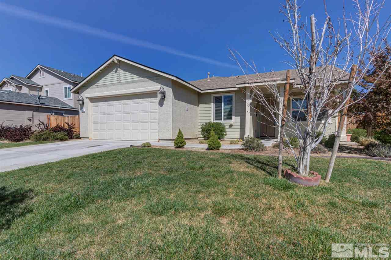 9045 Convair Way Reno, NV 89506 - Photo 2 of 34 a view of a house with a yard