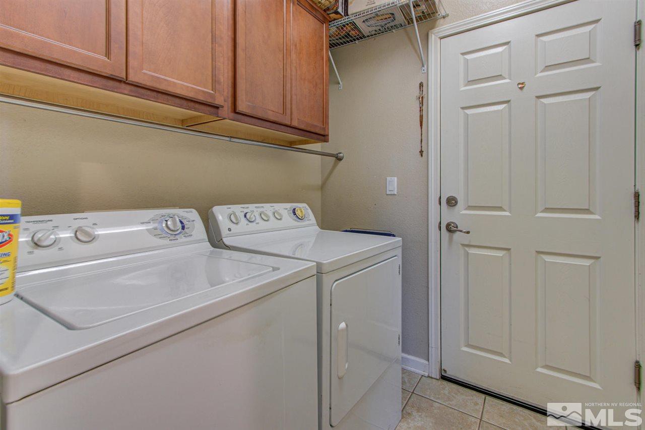 9045 Convair Way Reno, NV 89506 - Photo 29 of 34 a utility room with dryer and washer