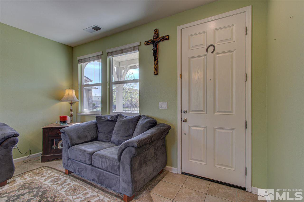 9045 Convair Way Reno, NV 89506 - Photo 3 of 34 a living room with furniture and a window