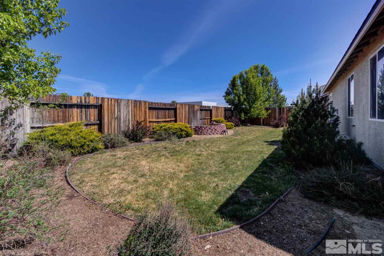 9045 Convair Way Reno, NV 89506 - Photo 33 of 34 a view of a backyard