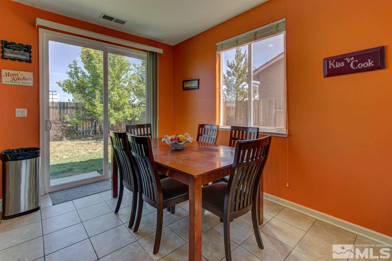 9045 Convair Way Reno, NV 89506 - Photo 9 of 34 a view of a dining room with furniture and window