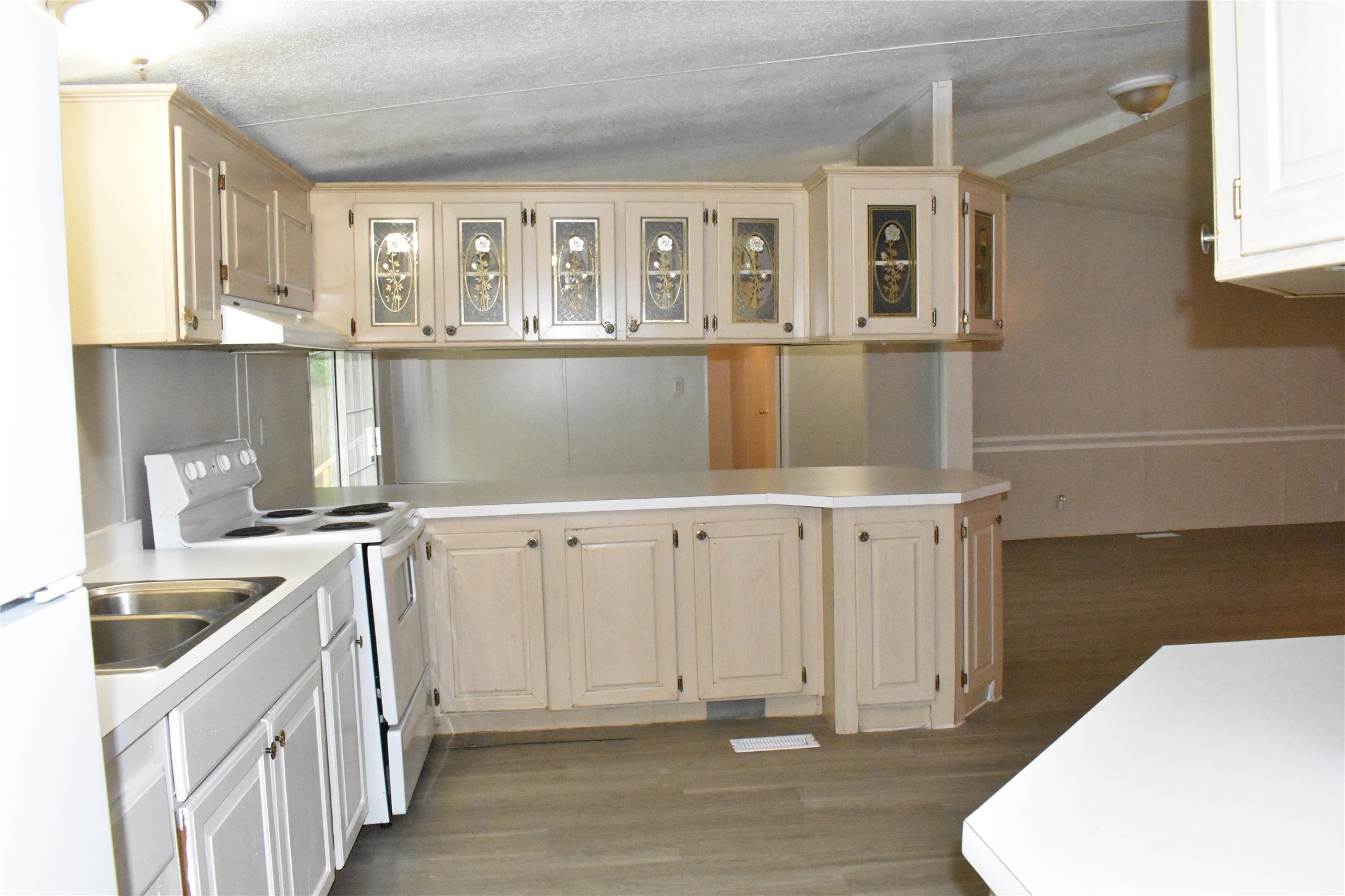 22536 Yancy Road Porter, TX 77365 - Photo 20 of 50 a kitchen with a sink and cabinets