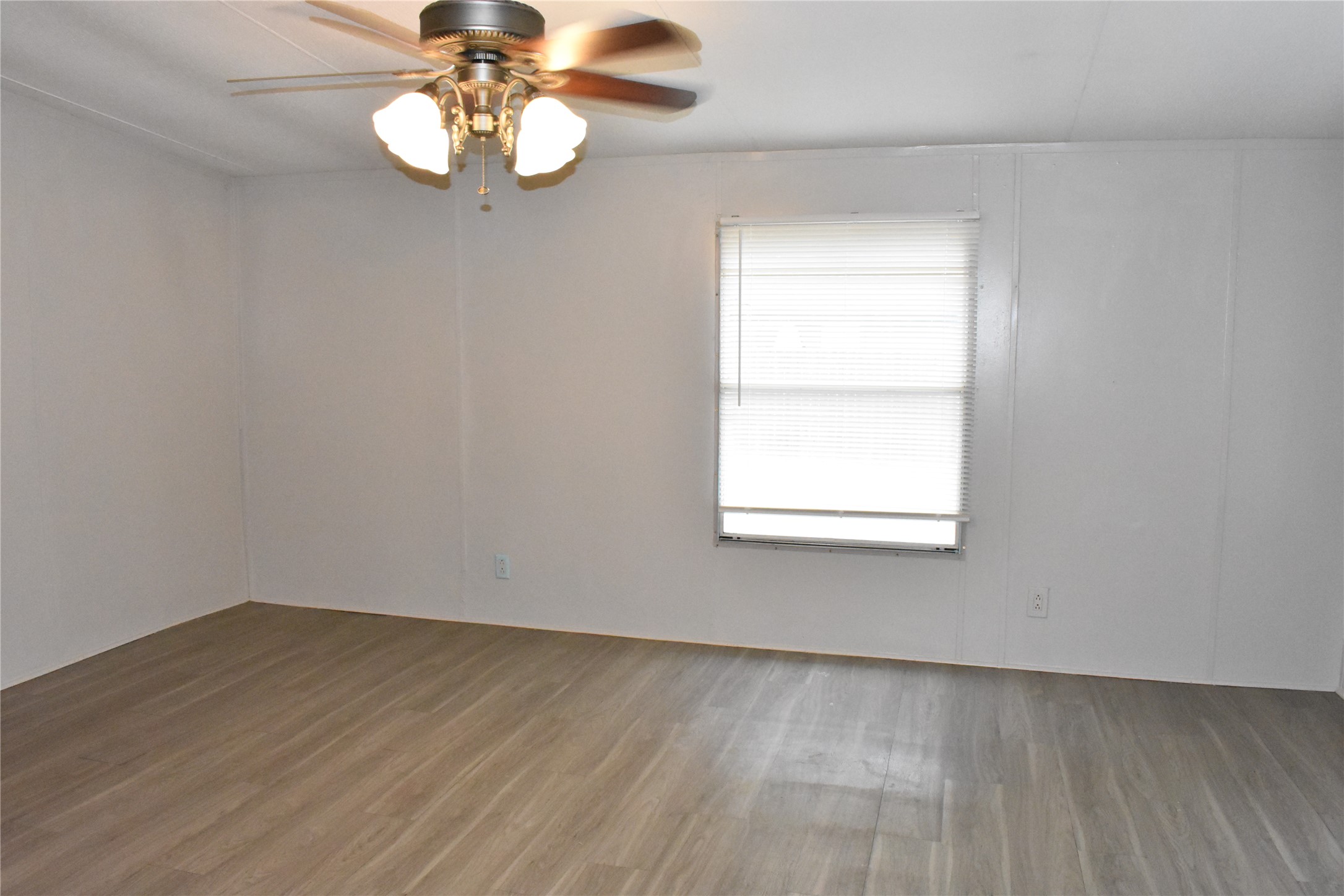 22536 Yancy Road Porter, TX 77365 - Photo 23 of 50 wooden floor in an empty room with a window