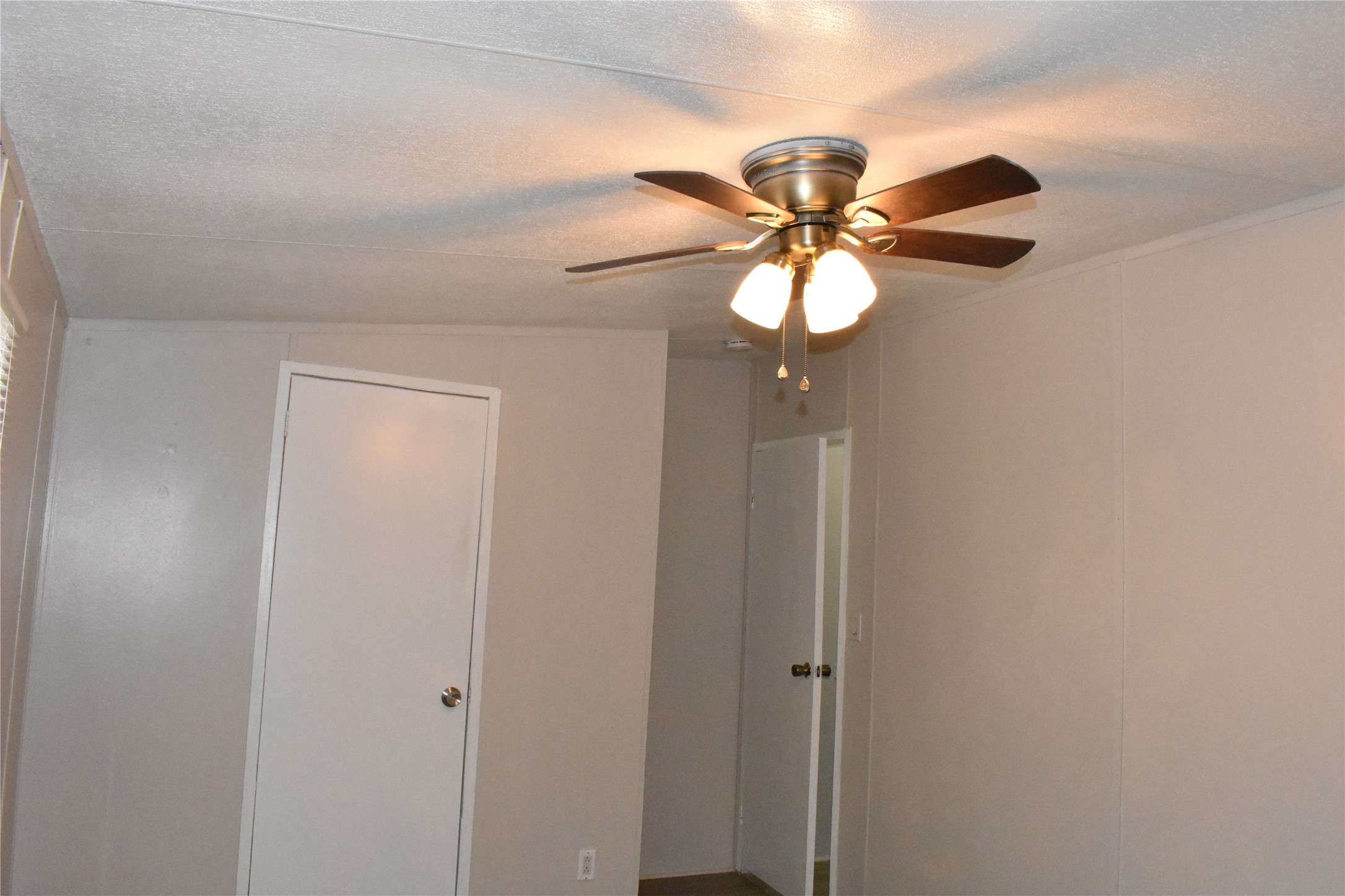 22536 Yancy Road Porter, TX 77365 - Photo 32 of 50 a view of a chandelier fan in a room